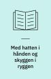 Med hatten i hånden og skyggen i ryggen